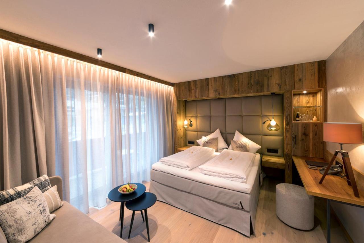 Aktivhotel Alpendorf Санкт Йохан им Понгау Екстериор снимка